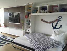 It can function as stylish seating when the room is in office mode and comfortable sleeping when the room is in guest room mode. Turn Your Home Office Into A Guest Room With A Murphy Bed