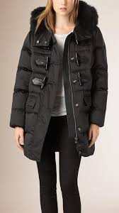 A warm hooded wool duffle coat with a detachable racoon fur trim. 420 Duffle Toggle Coats Ideas