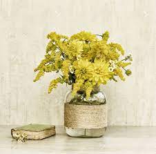 Little Old Book A Bouquet Of Flowers Chrysanthemums Goldenrod Stock Photo Picture And Royalty Free Image Image 61695097