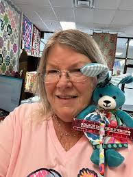 I have been blessedwith all this fabric..from 1 yard pieces to 5 yard  pieces..This 1 yard piece! I fell in love..called Black Bangs by Free  Spirit..can't waitvto see where it asks to