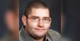 Justin T. Adams Obituary