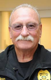 Amherst Police chief Lonnie Dillon, left, North Ri…