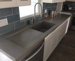 Concrete Countertop With Integrated Sink And Drainboard Www Kingsmenconcrete Com Interior Design Kitchen Concrete Countertops Kitchen Concrete Kitchen