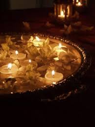 Diwali Time To Float Some Flowers And Light The Candles Floating Flower Candles Flower Candle Floating Candles
