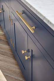 Dark Blue Shaker Style Kitchen Cabinets With Polished Brass Door Handles Kitchen Cabinet Styles Kitchen Door Handles Shaker Style Kitchens