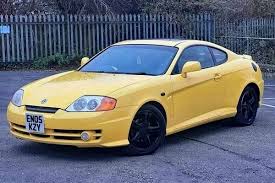 Image result for Sunny Yellow 2004 Tiburon