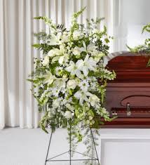 We take the mystery out of sending condolence flowers by answering the 10 most common questions people have about using flowers to express their sympathy. Rembrandt Florist At Restland The Ftd Loving Thoughts Standing Spray Dallas Tx 75243 Ftd Florist Flower And Gift Delivery