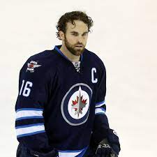 Tim gleason of the carolina hurricanes checks andrew ladd of the atlanta thrashers at philips arena on february 13, 2011 in atlanta, georgia. Is It Wrong Of Andrew Ladd To Put His Family Before The Winnipeg Jets Arctic Ice Hockey