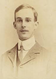 Mr. Ernest Scholar, my grandfather and headmaster of Mil-Lel school, ready  to ride to school for the day. Taken alongside the Hunt farmhouse (now  Turnbull) circa 1925 or thereabouts. He boarded with