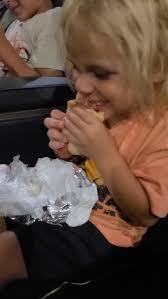 Luka was hungry to finish his hot dog before the movie started🤣😂, 🌭🌭,  #lukadaniel #babyluka #hotdog #movienight #popcorn #movienight  #howtotrainyourdragon #citywalk #orlando #hungry #starvingchild ...