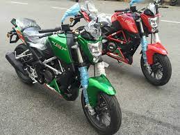 According to company officials, so far, around 250 bookings have already been confirmed and the sales target is 8,000 bikes over the next year. V Power Motor Benelli 250 Tnt250