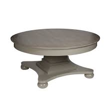 The monumental coffee table is made of italian travertine. William Round Coffeetable Clay Weathered Vintage Hedgeroe Home