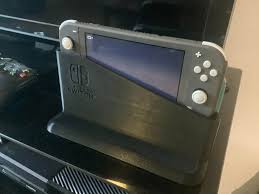 Grab your nintendo switch and put on the dock. I 3d Printed A Nintendo Switch Lite Dock So That Chargers Wouldn T Go Missing File Download In Comments Nintendoswitch
