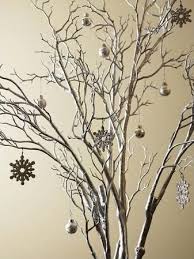 How To Decorate Tree Branches For A Winter Wonderland Themed Party Ehow Branch Centerpieces Tree Branch Centerpieces Tree Wedding Centerpieces