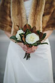 I especially like the colors selected: Garden Rose And Magnolia Leaf Simple Bridal Bouquet Winter Wedding Photo By Eric F Small Wedding Bouquets Magnolias Wedding Bouquet Simple Bridesmaid Bouquets