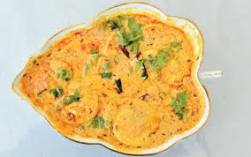 .paella is a spanish rice dish that is characterized by its use of saffron to give its yellow color and unique flavor. India S Culinary Heritage Gujarati Cuisine Outlook Traveller