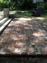 At the very base of your brick patio is a black landscaping fabric. Reclaimed Brick Patio Reminder To Reuse The Bricks From The Old Stack Chimney Modern Patio Patio Stones Reclaimed Brick Patio Backyard Patio