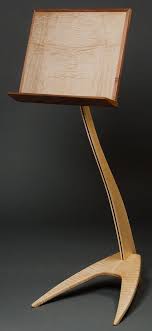 And when not in use, it serves as a handsome home accent for displaying art books or drawings. Custom Music Stand I Like The Feet On This Opposed To A Single Larger Pedestal Foot Music Stand Wooden Music Stand Wooden Guitar Stand