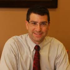 Dr. Ralph Dado Jr., MD