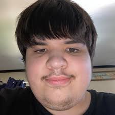 Who is TJ waving to?