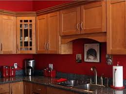 Oak Kitchen Cabinets With Red Walls Google Search Red Kitchen Walls Kitchen Color Red Kitchen Paint