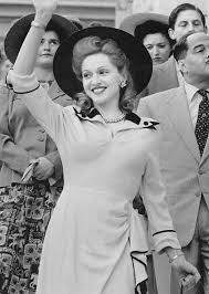 How do you reconcile the fact that eva peron was born in 1919 and madonna ciccone in 1930? Evita 1996
