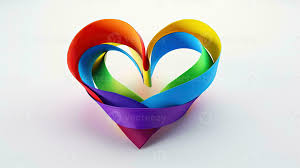 A heart shaped LGBT rainbow ribbon rests on a white backdrop representing  same sex love and pride. silhouette concept 27597740 Stock Photo at Vecteezy