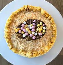 Simple to make and deliciously creamy, with a crumbly biscuit base, it is foolproof! Toasted Coconut Easter Cheesecake With Gingernut Base Just A Mum