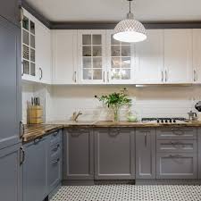 This kitchen shows blue on the base cabinets and wood on the upper cabinets. Pin On Kuhnya Dizajn