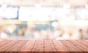 Next, lay the middle strip of wallpaper on the top of the table and carefully move into position so it is in the centre. Wood Table Top And Blurred Restaurant Kitchen Interior Background Stock Photo Picture And Royalty Free Image Image 97224315