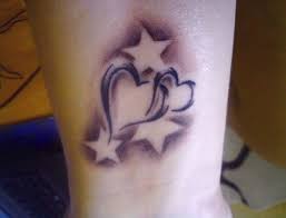 Stars and heart tattoo on right back shoulder. Interest Tattoo Ideas And Design Lovely Mother And Daughter Tattoo On Hip Photo 2 If You Wan Star Tattoo Designs Heart Tattoo Designs Simple Heart Tattoos