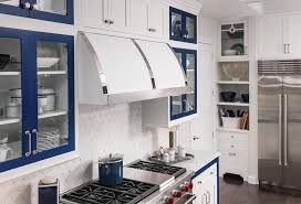 Traditional european style elements include an arched bonnet with acanthus scroll keystone. Aco Product Feature Medallion Cabinetry Aco