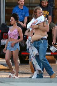 Shia labeouf was spotted on the set of his new film honey boy looking completely unrecognizable with long hair extensions and a blading cap. Shia Labeouf Sports Fake Belly While Shooting Scenes With Fka Twigs Pic Entertainment Tonight