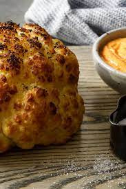 Whole Roasted Cauliflower With Romesco Recipe Recipe Recipes Whole Roasted Cauliflower Nyt Cooking