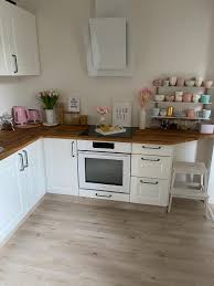 The surrounding glass windows and doors also serve to make space appear bigger. English Country Kitchen Interiors Guide E Architect