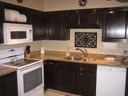 Pin By Lisa Wood On Kitchen Dining Room Stained Kitchen Cabinets Paint For Kitchen Walls Kitchen Cabinet Colors