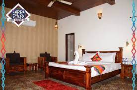 While In Amritsar Stay In Exquisite Guest Rooms Furnished In Traditional Style Experience Authentic Punjabi Village L Room Furnishing Home Decor Furnishings