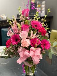 The pink flower opens and closes again. Pink Dream By Merced Floral