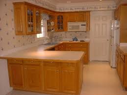 Laminate countertops with oak cabinets. Booth Construction Inc Kitchen Remodeling
