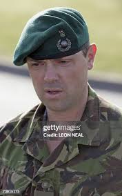 Lt Col Andy Price addresses the media outside the Royal Marine... News  Photo