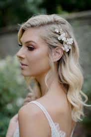 The short hair is simply drawn back and secured in a low pony tail. Swept Away 7 Delicate Wedding Hair Combs For Side Swept Hair Tania Maras Bespoke Wedding Headpieces Wedding Veils
