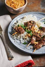 In a small saucepan mix together peanut butter, soy sauce, chilli flakes, fish sauce, coconut milk, light brown sugar and ground coriander whilst heating. Lamb Satay With Peanut Sauce Recipe The Mom 100