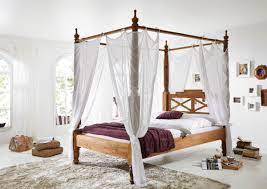 This tester or panel will often have rails to allow curtains to be pulled around the bed. Wooden Four Poster Bed 180x200 Cm Made Of Sheesham Palisander Wood Color Brown With White Cover Supply24