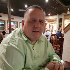 Who recommends a local company in Mobile, Alabama for making and installing  metal logo signs?