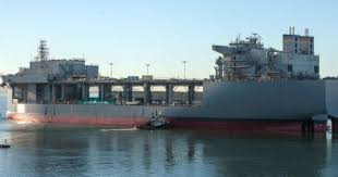 How The U S Navy Turned An Oil Tanker Into A Helicopter Sea Base Oil Tanker Tanker Ship General Dynamics