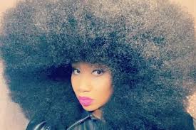 Aevin Douglas is in the Guinness Book of World Records for having the  largest Afro, she says she used to think her hair was awful, before she  learned to love it... #krnb #