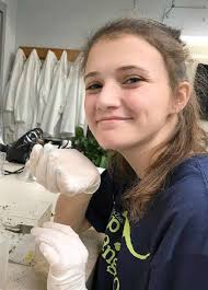 LIONS, TIGERS, AND TEENS: PROMOTING INTEREST IN SCIENCE AS A CAREER PATH  THROUGH TEEN VOLUNTEERING