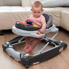 Mein großer hat auch eins aber nicht lange. 2in1 Lauflernhilfe Mit Schaukelfunktion Spielcenter 12 Melodien Licht Gehfrei Gehhilfe Baby Walker Babyschaukel Schwarz Grau Amazon De Baby