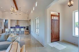 Light Stained Concrete Floors And High Ceilings On Countertops Small Apartment Interior High Ceiling Living Room Concrete Stained Floors