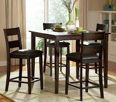 This dining table and chairs are a few years old but it is perfectly servicable. Griffin Transitional Counter Dining Room Set Table 5 Chairs Tall Dining Room Table Kitchen Table Settings Top Kitchen Table